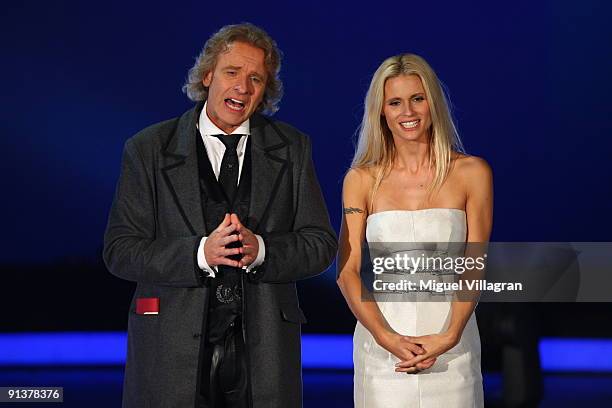 Host Thomas Gottschalk and Michelle Hunziker pose during the Wetten dass...? show at the Messe Freiburg on October 3, 2009 in Freiburg, Germany.