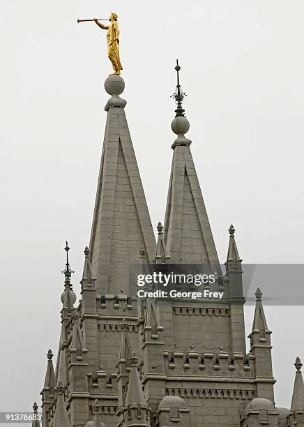 The golden Angle Moroni stands atop the Mormon Salt Lake temple while the 179th Semi-Annual General Conference of the Mormon church takes place on...