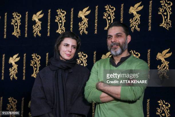 Iranian actress and director Leila Hatami poses for a picture with Iranian-American actor and director Peyman Moaadi as they arrive for a film...