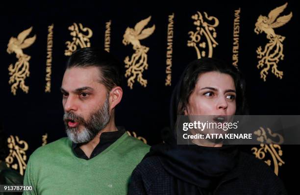 Iranian actress and director Leila Hatami poses for a picture with Iranian-American actor and director Peyman Moaadi as they arrive for a film...