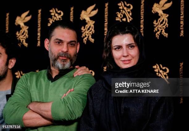 Iranian actress and director Leila Hatami poses for a picture with Iranian-American actor and director Peyman Moaadi as they arrive for a film...