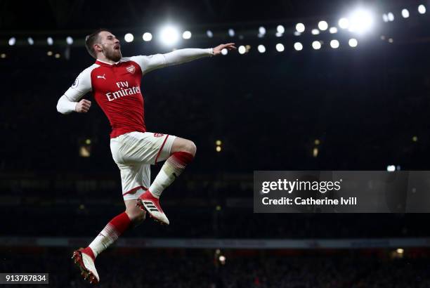 Aaron Ramsey of Arsenal celebrates after scoring his sides fifth goal and his hat-trick during the Premier League match between Arsenal and Everton...