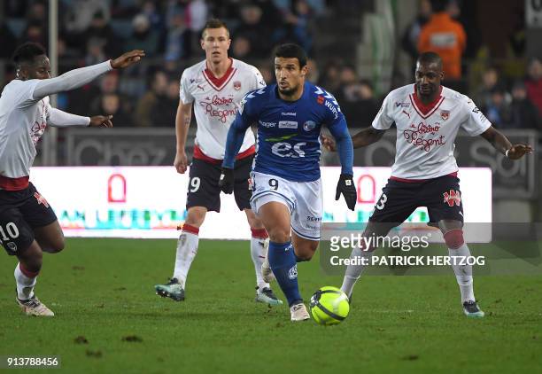 Strasbourg's Algerian forward Idriss Saadi vies with Bordeaux's French midfielder Souahilo Meite, Bordeaux's Danish midfielder Lukas Lerager and...