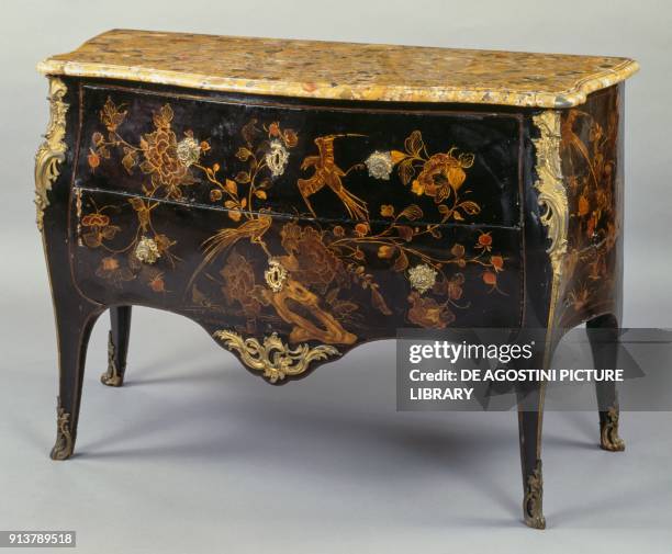 Louis XV style commode, in European lacquer with polychrome decorations on a black background according to Chinese taste, with Aleppo marble top, two...