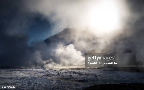 kafla lava field steam in the sky in winter iceland - detriti foto e immagini stock
