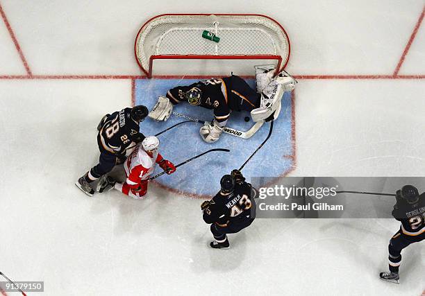 Dan Cleary of Detroit Red Wings has a shot stopped by Ty Conklin of St. Louis Blues during the 2009 Compuware NHL Premiere Stockholm match between...