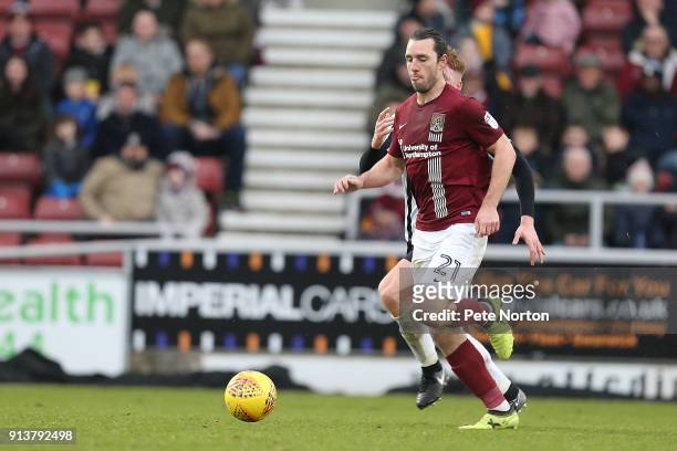 John-Joe O'Toole of Northampton Town moves forward with the ball during the Sky Bet League One match between Northampton Town and Rochdale at...