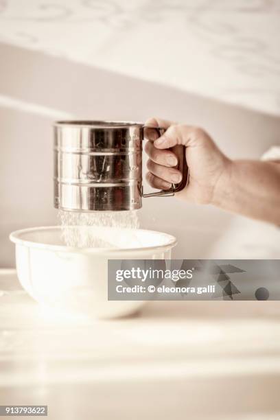 sieve for flour - flour shaker stock pictures, royalty-free photos & images