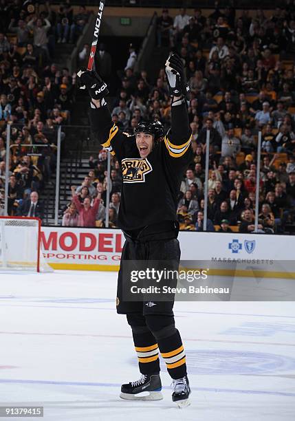 Zdeno Chara of the Boston Bruins celebrates a goal against the Carolina Hurricanes at the TD Banknorth Garden on October 3, 2009 in Boston,...