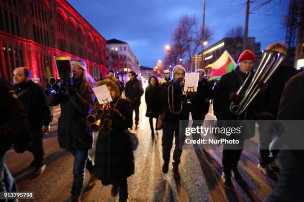 Activists playing music. More than 1000 people joined the protest against the turkish bombing of the kurdish region in Syria Afrin, in Munich,...