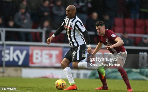 Calvin Andrew of Rochdale controls the ball watched by Regan Poole of Northampton Town during the Sky Bet League One match between Northampton Town...