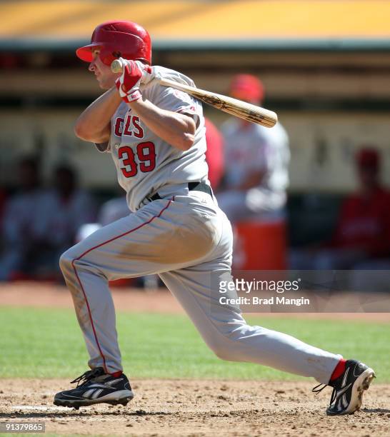Robb Quinlan of the Los Angeles Angels of Anaheim bats against the Oakland Athletics during the game at the Oakland-Alameda County Coliseum on...