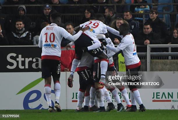 Bordeaux's players celebrate after scoring a goal during the French L1 football match between Strasbourg and Bordeaux on February 3 at the Meinau...