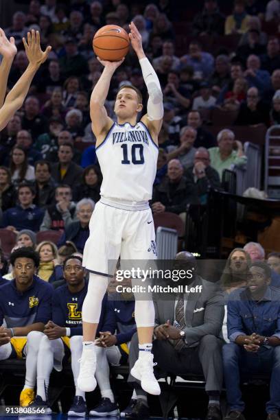 Donte DiVincenzo of the Villanova Wildcats shoots the ball against the La Salle Explorers at the Wells Fargo Center on December 10, 2017 in...