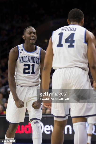 Dhamir Cosby-Roundtree of the Villanova Wildcats reacts along with Omari Spellman against the La Salle Explorers at the Wells Fargo Center on...
