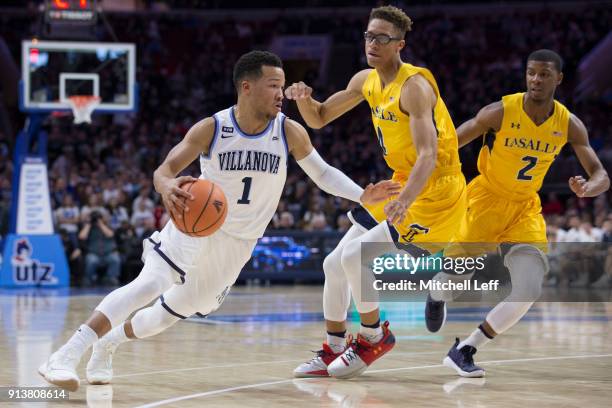 Jalen Brunson of the Villanova Wildcats drives to the basket against Miles Brookins and Amar Stukes of the La Salle Explorers at the Wells Fargo...