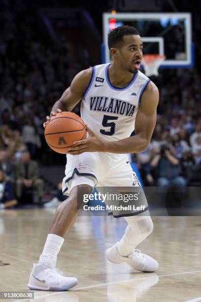 Phil Booth of the Villanova Wildcats controls the ball against the La Salle Explorers at the Wells Fargo Center on December 10, 2017 in Philadelphia,...