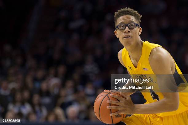 Miles Brookins of the La Salle Explorers looks to pass the ball against the Villanova Wildcats at the Wells Fargo Center on December 10, 2017 in...