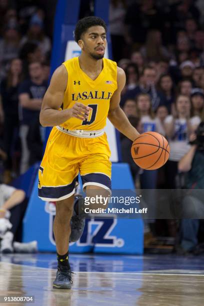 Pookie Powell of the La Salle Explorers dribbles the ball against the Villanova Wildcats at the Wells Fargo Center on December 10, 2017 in...