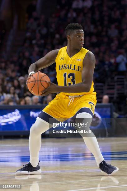 Saul Phiri of the La Salle Explorers controls the ball against the Villanova Wildcats at the Wells Fargo Center on December 10, 2017 in Philadelphia,...