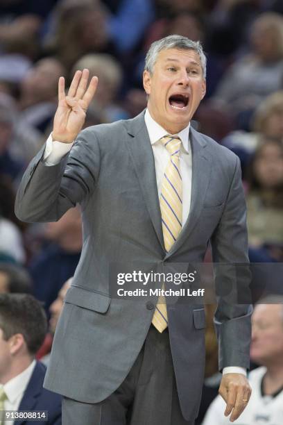 Head coach Dr. John Giannini of the La Salle Explorers yells out to his team against the Villanova Wildcats at the Wells Fargo Center on December 10,...