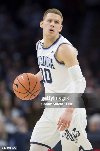 Donte DiVincenzo of the Villanova Wildcats dribbles the ball against the La Salle Explorers at the Wells Fargo Center on December 10, 2017 in...