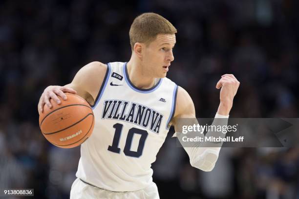 Donte DiVincenzo of the Villanova Wildcats dribbles the ball against the La Salle Explorers at the Wells Fargo Center on December 10, 2017 in...