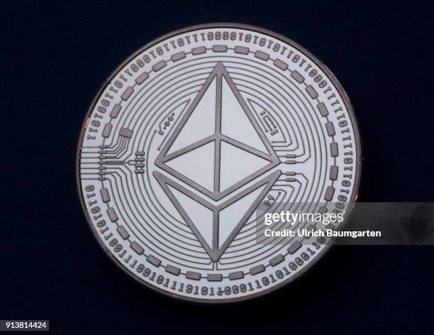 Symbol photo on the topics cryptocurrency, digital currency, Speculation, currency speculation, etc. The picture shows Ethereum, Bitcoin and Ripple...