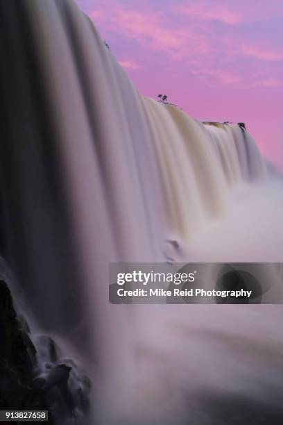 iguacu falls brazil sunrise light - iguacu nationalpark stock-fotos und bilder