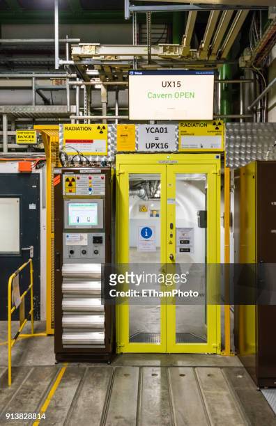 large hadron collider (lhc) nuclear particle accelerator at cern, geneva (switzerland) - sliding door exit stock pictures, royalty-free photos & images