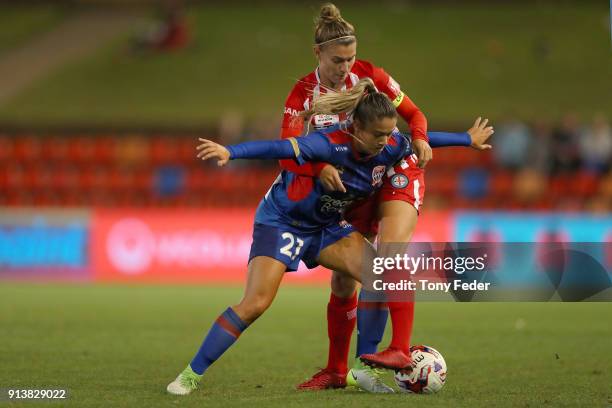 Panagiota Petratos of the Jets contests the ball with Stephanie Catley of City during the round 14 W-League match between the Newcastle Jets and...