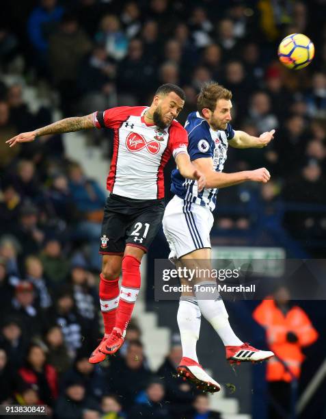 Gareth McAuley of West Bromwich Albion is challenged by Ryan Bertrand of Southampton during the Premier League match between West Bromwich Albion and...