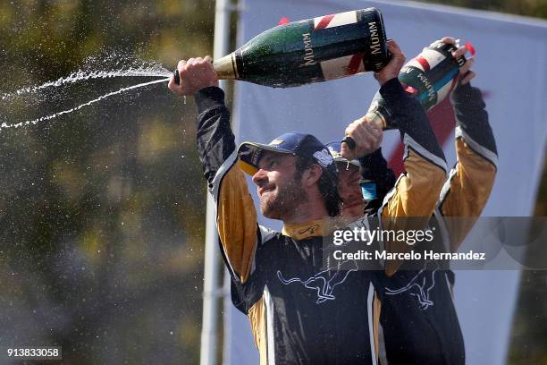 Jean-Eric Vergne, of France, Techeetah celebrates his victory with teammate Andre Lotterer of Germany during the ABB Formula-E Antofagasta Minerals...