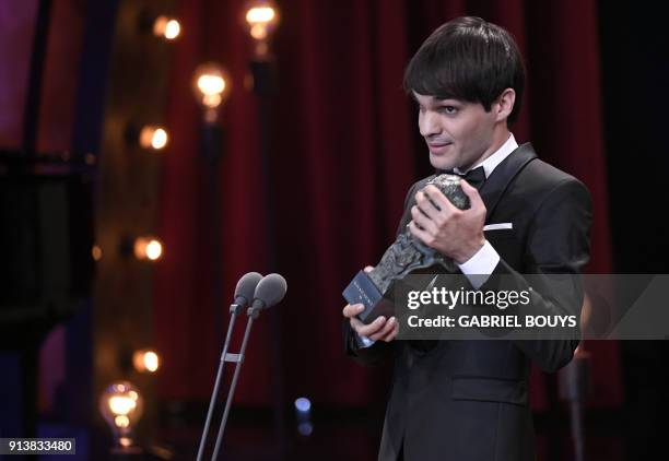 Spanish actor Eneko Sagardoy receives the best new actor award for 'Handia' at the 32nd Goya awards ceremony in Madrid on February 3, 2018. / AFP...