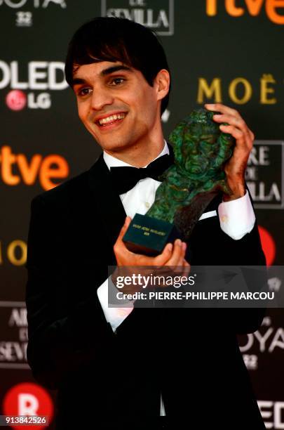Spanish actor Eneko Sagardoy poses after receiving the best new actor award for 'Handia' at the 32nd Goya awards ceremony in Madrid on February 3,...