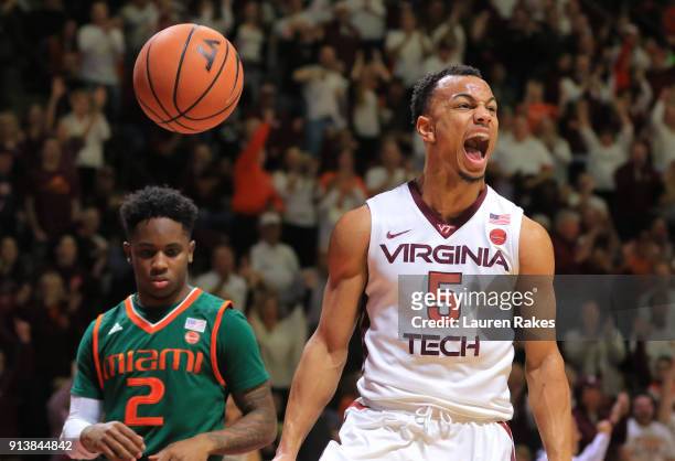 Justin Robinson of the Virginia Tech Hokies celebrates during the game against the Miami Hurricanes at Cassell Coliseum on February 3, 2018 in...