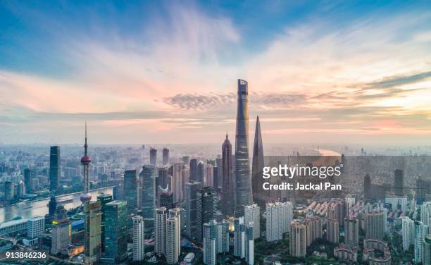 aerial view of shanghai financial district with sunrise - shanghai stockfoto's en -beelden