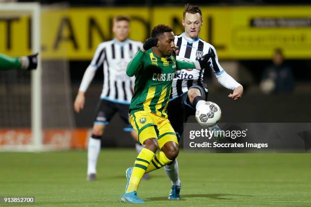 Sheraldo Becker of ADO Den Haag, Jeff Hardeveld of Heracles Almelo during the Dutch Eredivisie match between Heracles Almelo v ADO Den Haag at the...