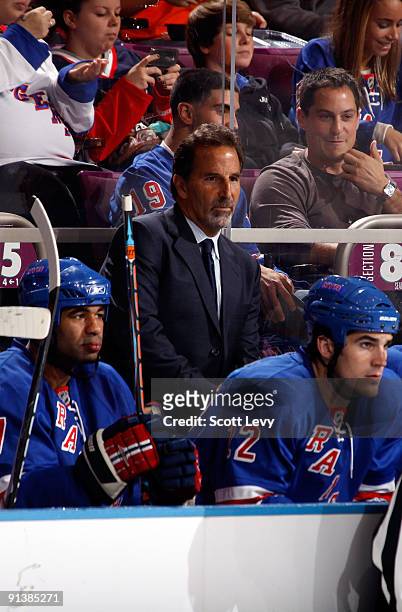 Head coach John Tortorella of the New York Rangers watches game action from the bench during the second period against the Ottawa Senators on October...