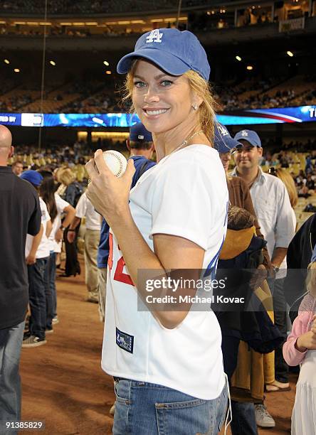 Model Kathy Ireland poses before throwing out the ceremonial first pitch at Dodger Stadium on October 3, 2009 in Los Angeles, California.