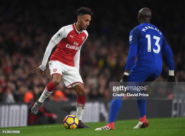 Pierre-Emerick Aubameyang of Arsenal is closed down by Eliaquim Mangala of Everton during the match the Premier League match between Arsenal and...