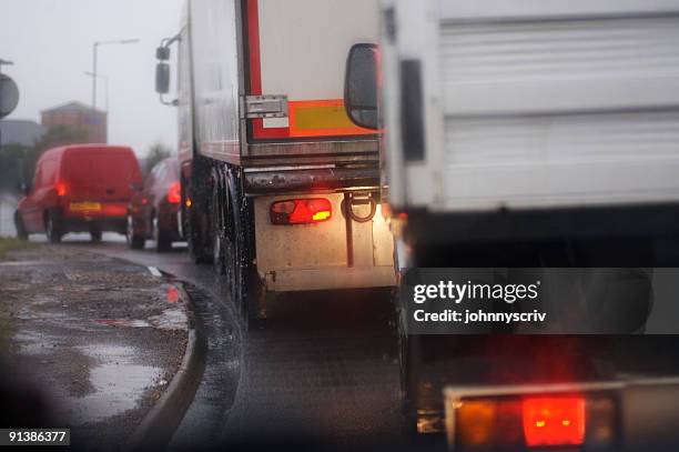 traffic jam... - trucks on queue stock pictures, royalty-free photos & images