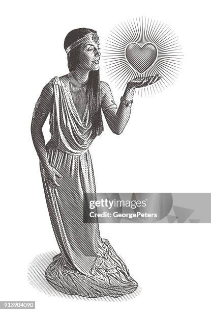 engraving of beautiful goddess of love and romance holding glowing heart - aphrodite stock illustrations