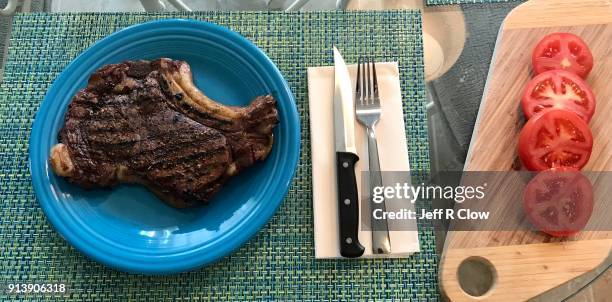 home grilled steak on a plate for a big meal with tomatoes - freshness guard stock pictures, royalty-free photos & images