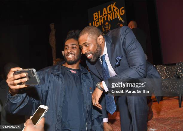 Actor Cress Williams takes a selfie with a fan during a screening and Q&A for 'Black Lightning' on Day 3 of the SCAD aTVfest 2018 on February 3, 2018...