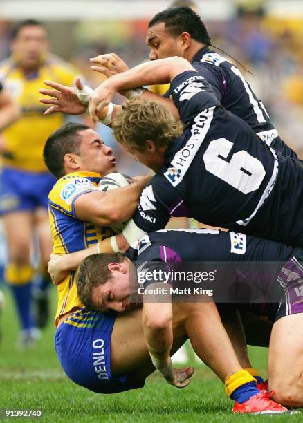 Jarryd Hayne of the Eels is gang tackled by Storm players during the 2009 NRL Grand Final match between the Parramatta Eels and the Melbourne Storm...