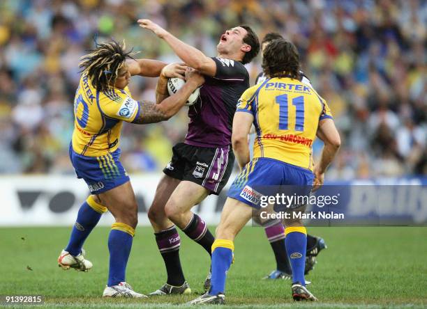 Fuifui Moimoi of the Eels and Brett White of the Storm collide during the 2009 NRL Grand Final match between the Parramatta Eels and the Melbourne...