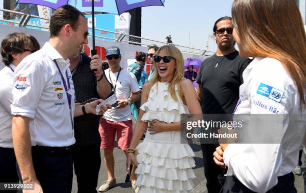 In this handout provided by FIA Formula E - Kylie Minogue on the grid during the Santiago ePrix, Round 4 of the 2017/18 FIA Formula E Series on...