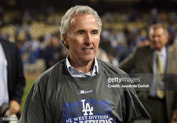 Owner Frank McCourt celebrates after winning the National League West against the Colorado Rockies on October 3, 2009 in Los Angeles, California.