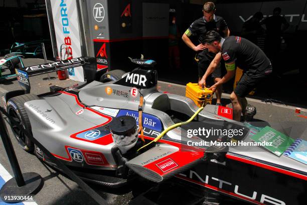 Mechanic works on Nelson Piquet Jr , Panasonic Jaguar Racing car during the ABB Formula-E Antofagasta Minerals Santiago E-Prix on February 3, 2018 in...